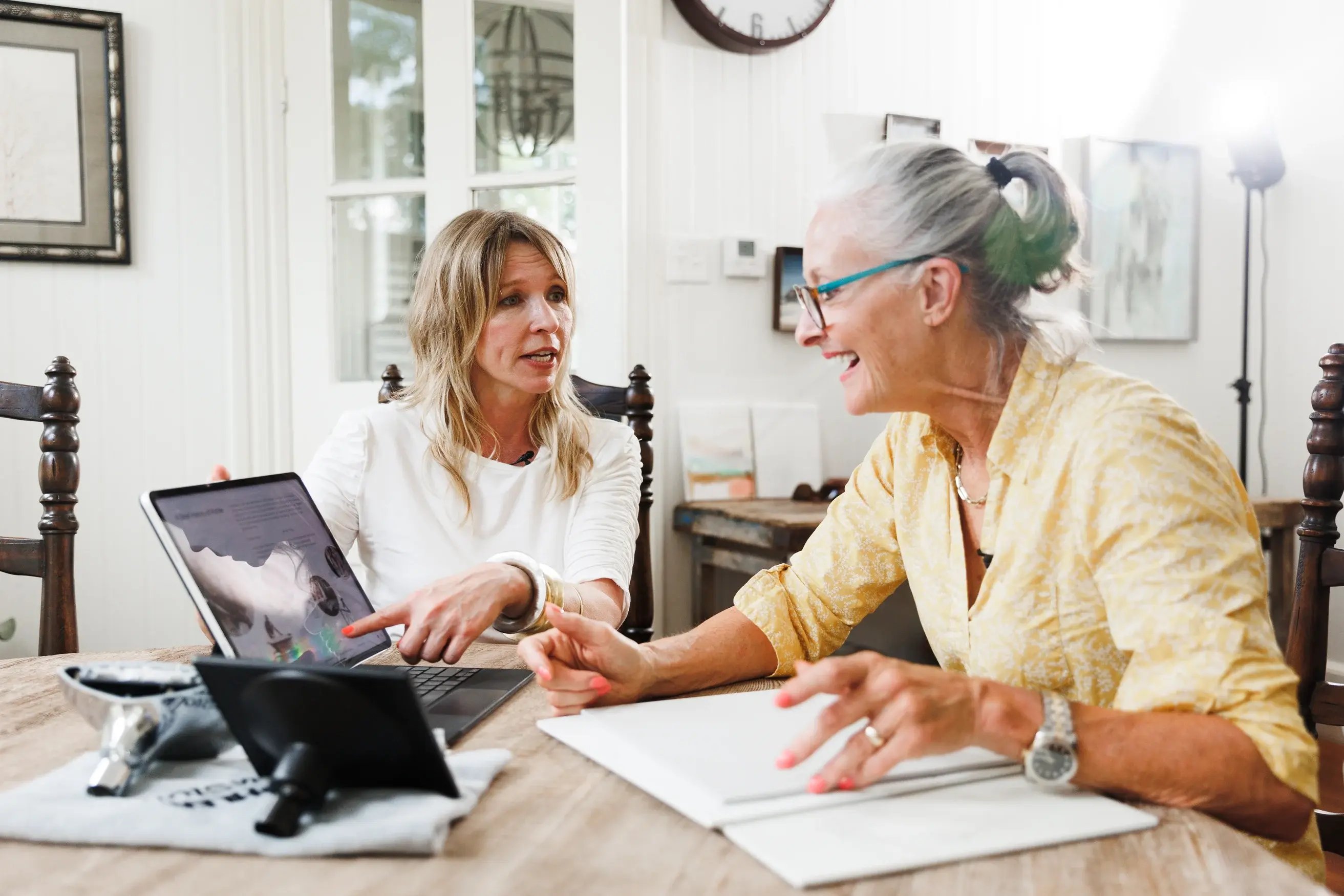 Homeowner discussing bathroom remodel design with consultant during in-home consultation in Denver, Colorado
