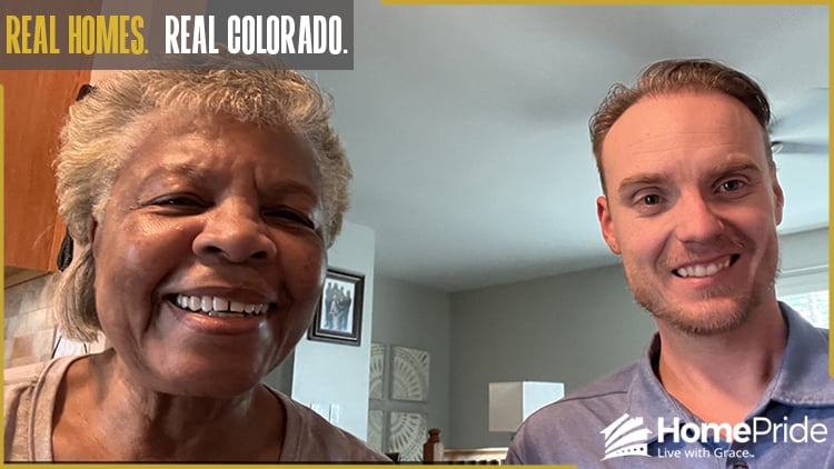 HomePride Bath customer and installer smiling together in the homeowner's Colorado residence