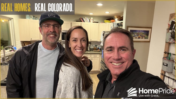HomePride Bath customer and installer smiling together in the homeowner's Colorado residence