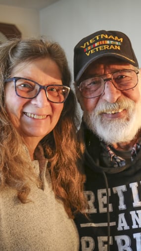 Cheryl and George Neama, longtime Colorado Springs residents, in their home after upgrading their bathroom with a safer walk-in shower.