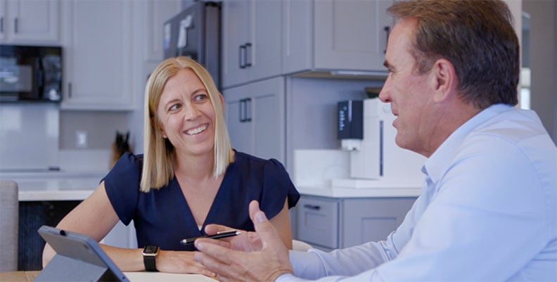 HomePride Bath bathroom design consultation with customer discussing remodel plans