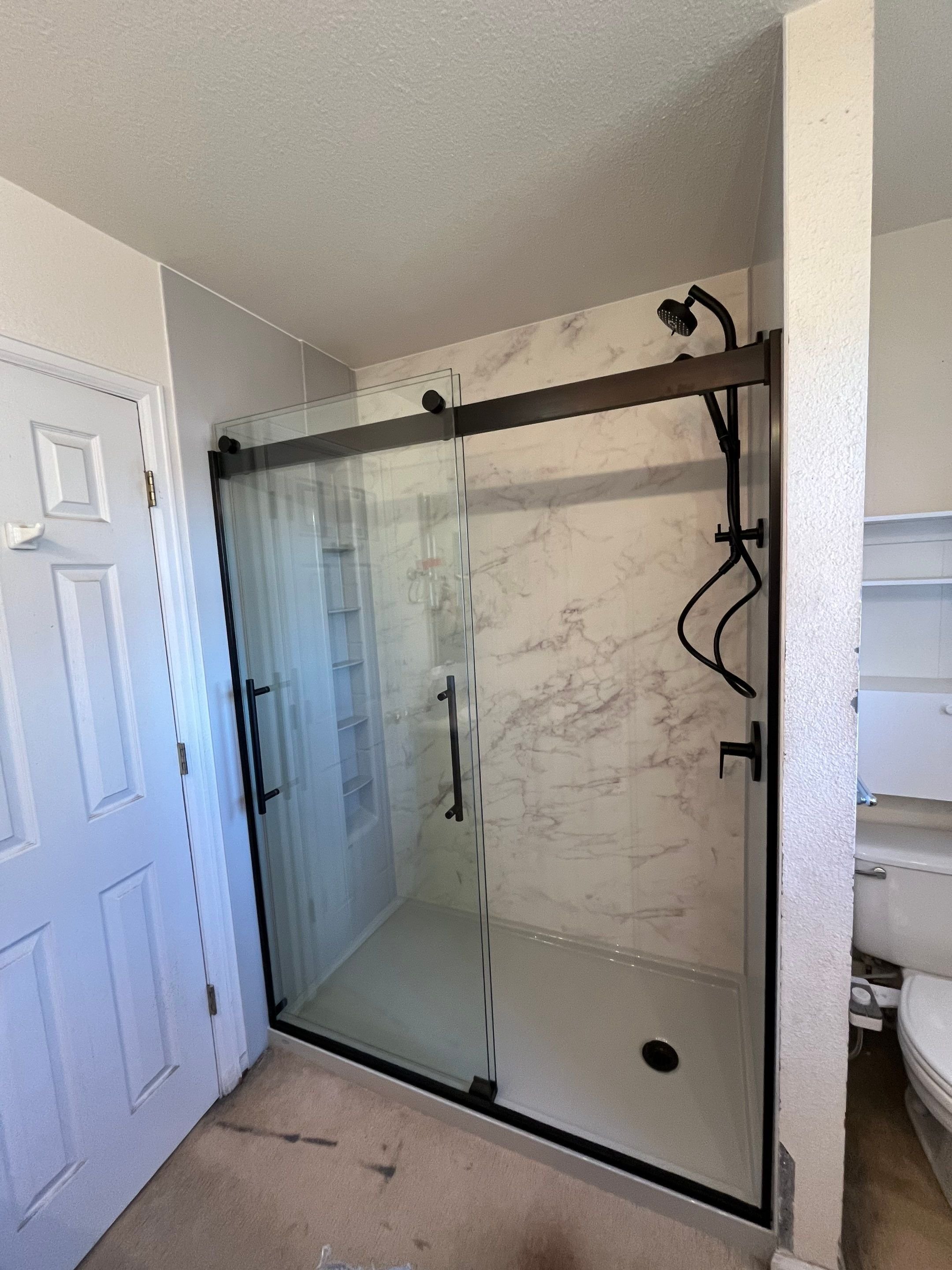 A beautiful new Kohler walk-in shower installed on Crestridge Place in Centennial, Colorado