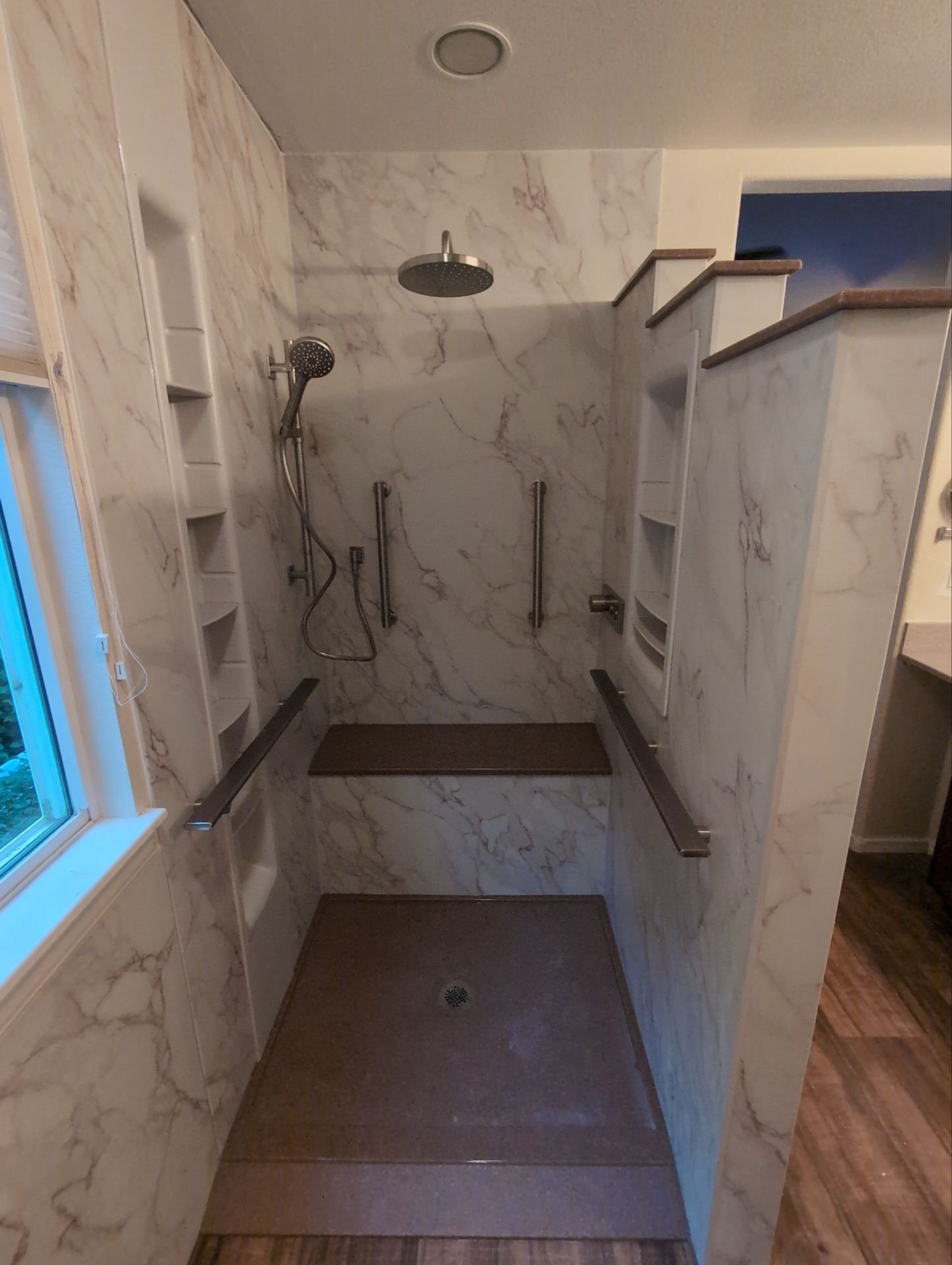 Tub-to-shower conversion on Curtiss Court in Fort Collins with low-maintenance wall panels and updated plumbing fixtures