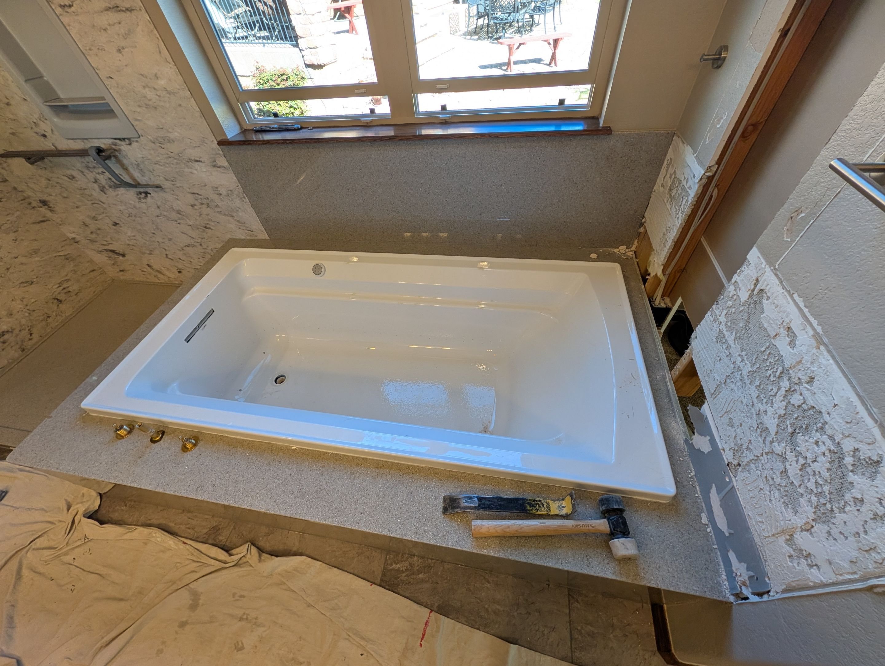 The wet area of a Lakewood, Colorado bathroom under construction during a bathroom remodel project.