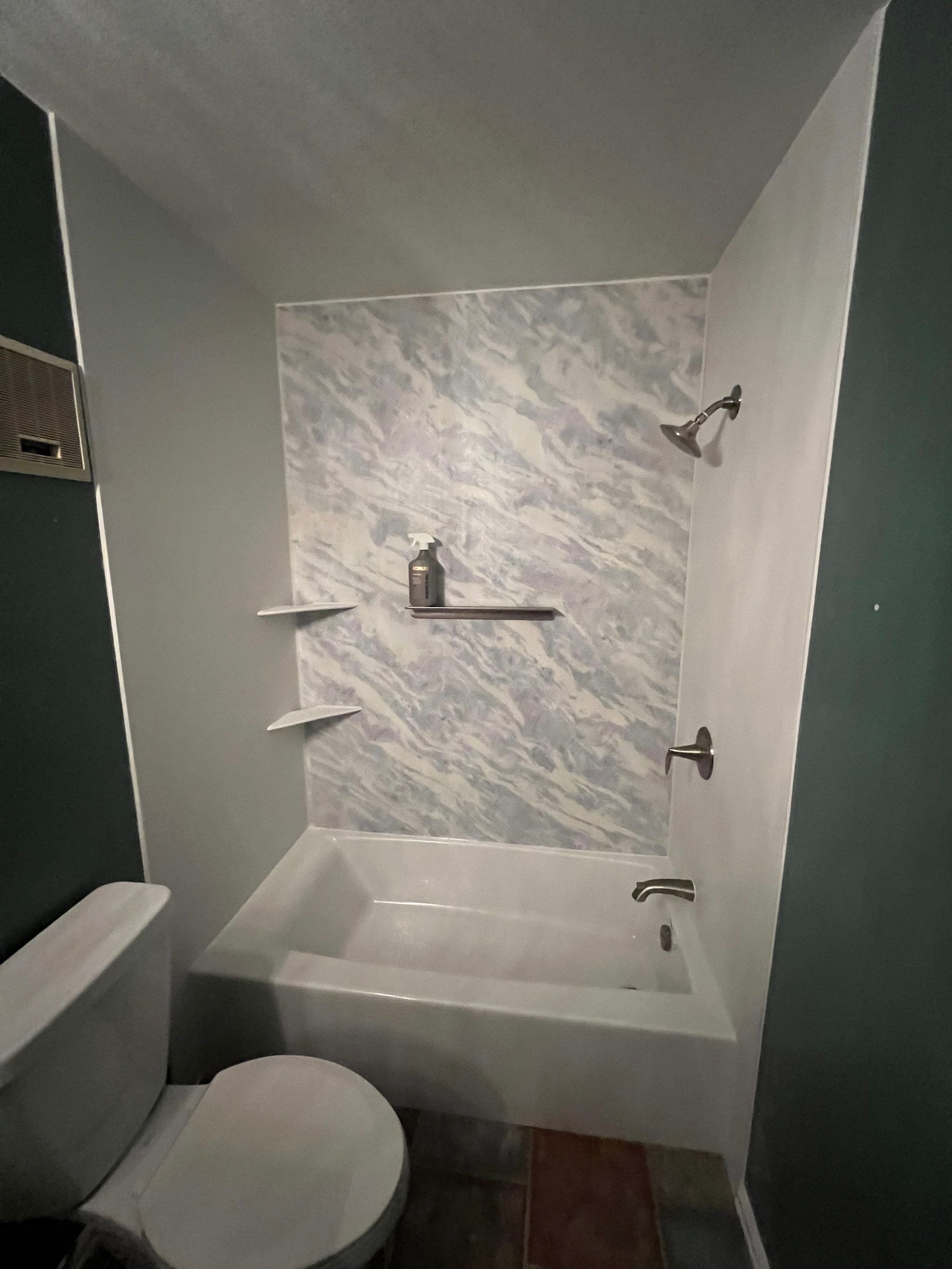 Thornton bathroom upgrade on Forest Street with a modern shower system, durable wall surfaces, and improved airflow to control moisture and humidity.