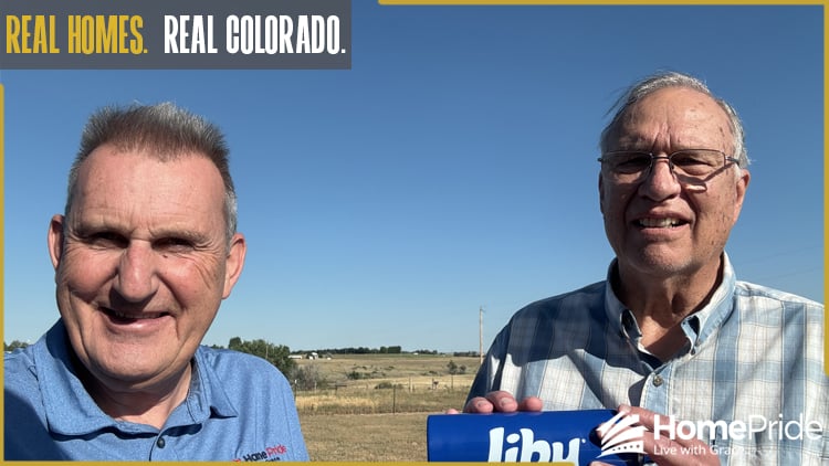 HomePride Bath customer and installer smiling together in the homeowner's Colorado residence