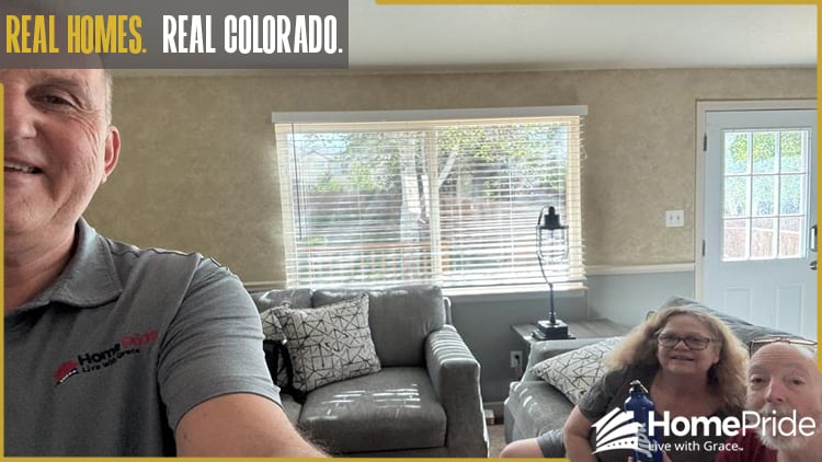 HomePride Bath customer and installer smiling together in the homeowner's Colorado residence
