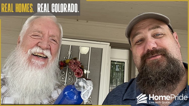 HomePride Bath customer and installer smiling together in the homeowner's Colorado residence