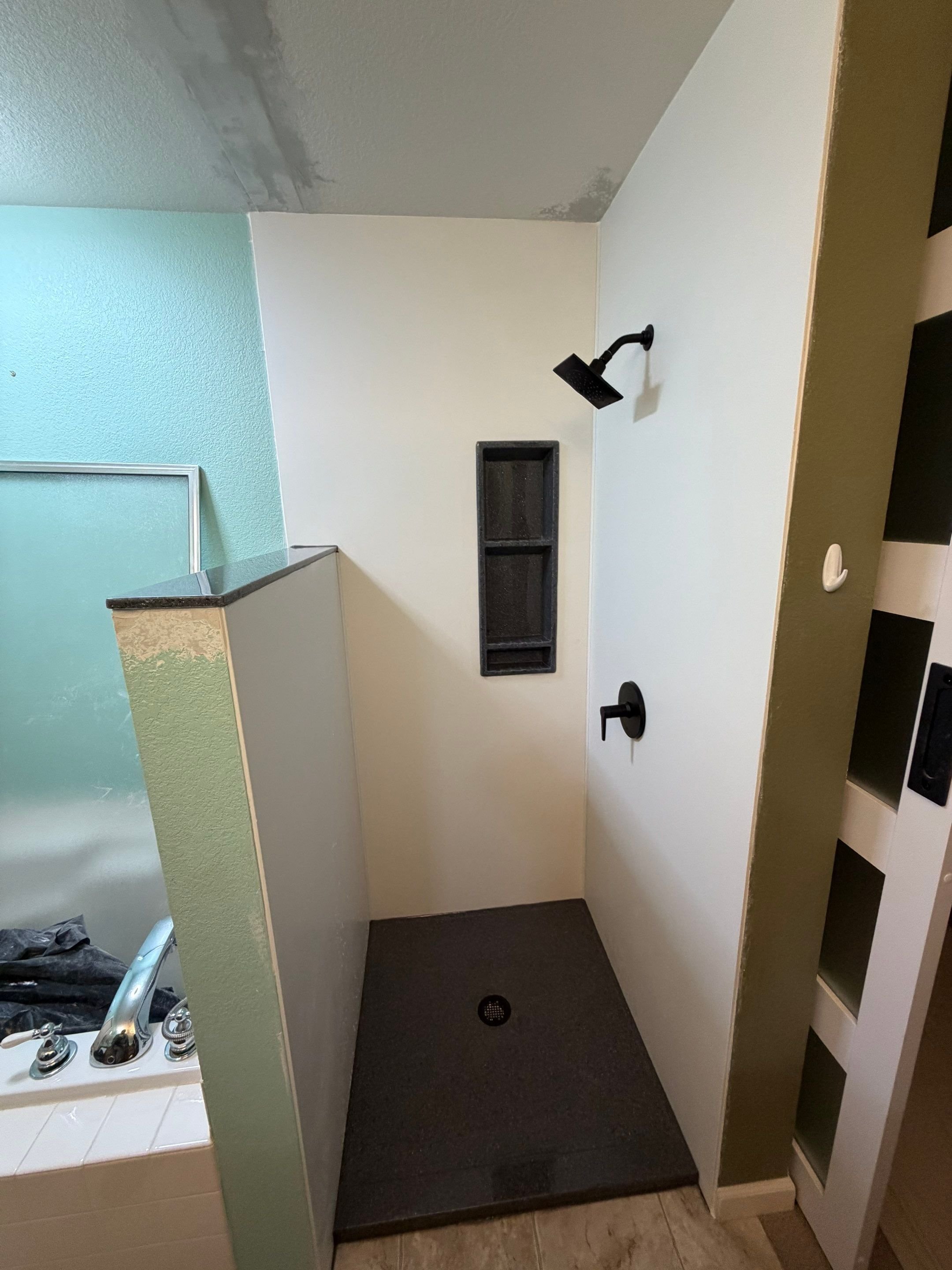 Shower replacement project on Halfmoon Circle in Loveland with updated glass enclosure, improved drainage, and durable wall systems built for Front Range homes.