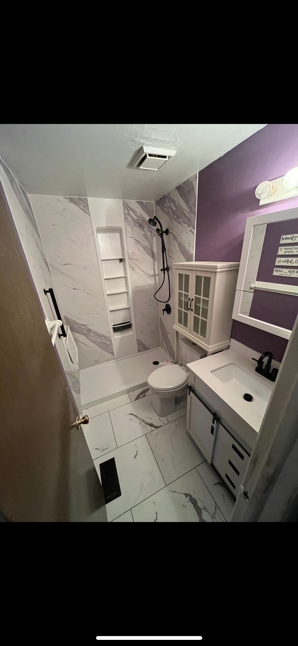 Accessibility-focused bathroom remodel in Littleton, CO on Calhoun Place featuring a walk-in tub, grab bars, and slip-resistant surfaces for safer daily use.