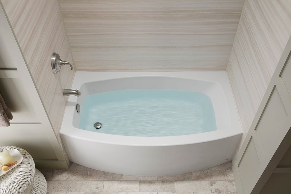 Updated alcove tub with KOHLER wall panels and brushed nickel fixtures