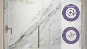 Kohler LuxStone Calacatta Gold marble-look shower wall with antimicrobial and non-porous features, ideal for mold-resistant, low-maintenance bathroom remodeling.