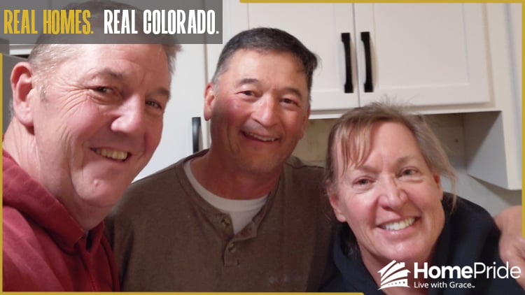 HomePride Bath customer and installer smiling together in the homeowner's Colorado residence