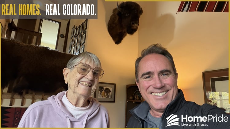 HomePride Bath customer and installer smiling together in the homeowner's Colorado residence