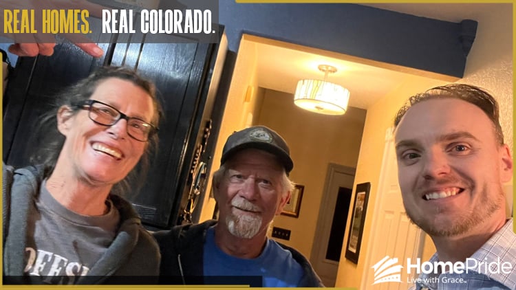 HomePride Bath customer and installer smiling together in the homeowner's Colorado residence