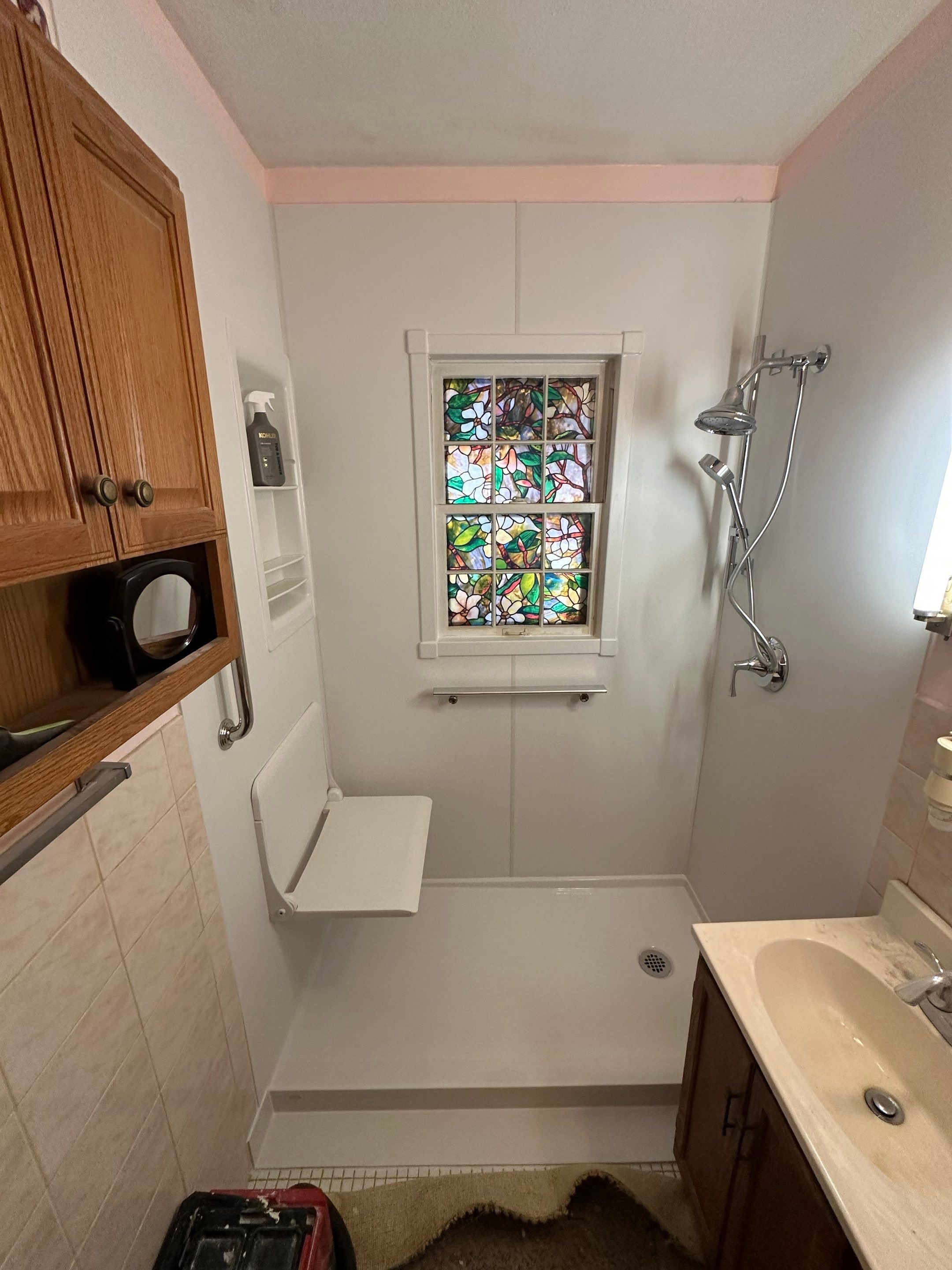 Pueblo Colorado bathroom remodel on Pike Avenue with walk-in shower, glass enclosure, updated vanity, and water-resistant flooring