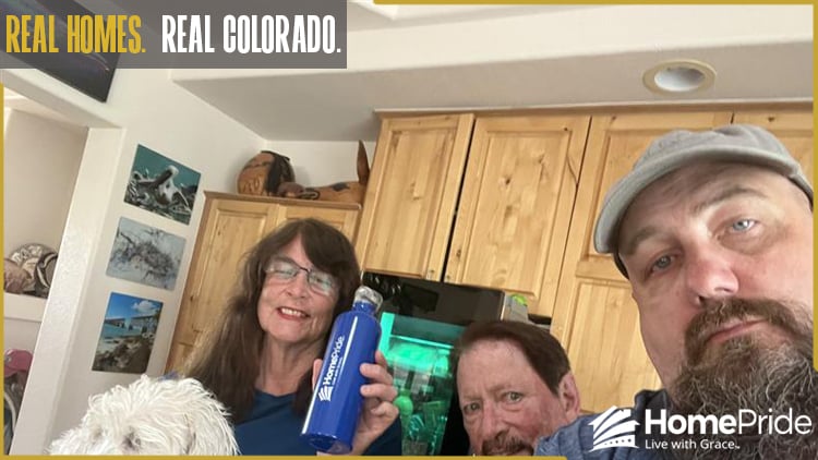 HomePride Bath customer and installer smiling together in the homeowner's Colorado residence