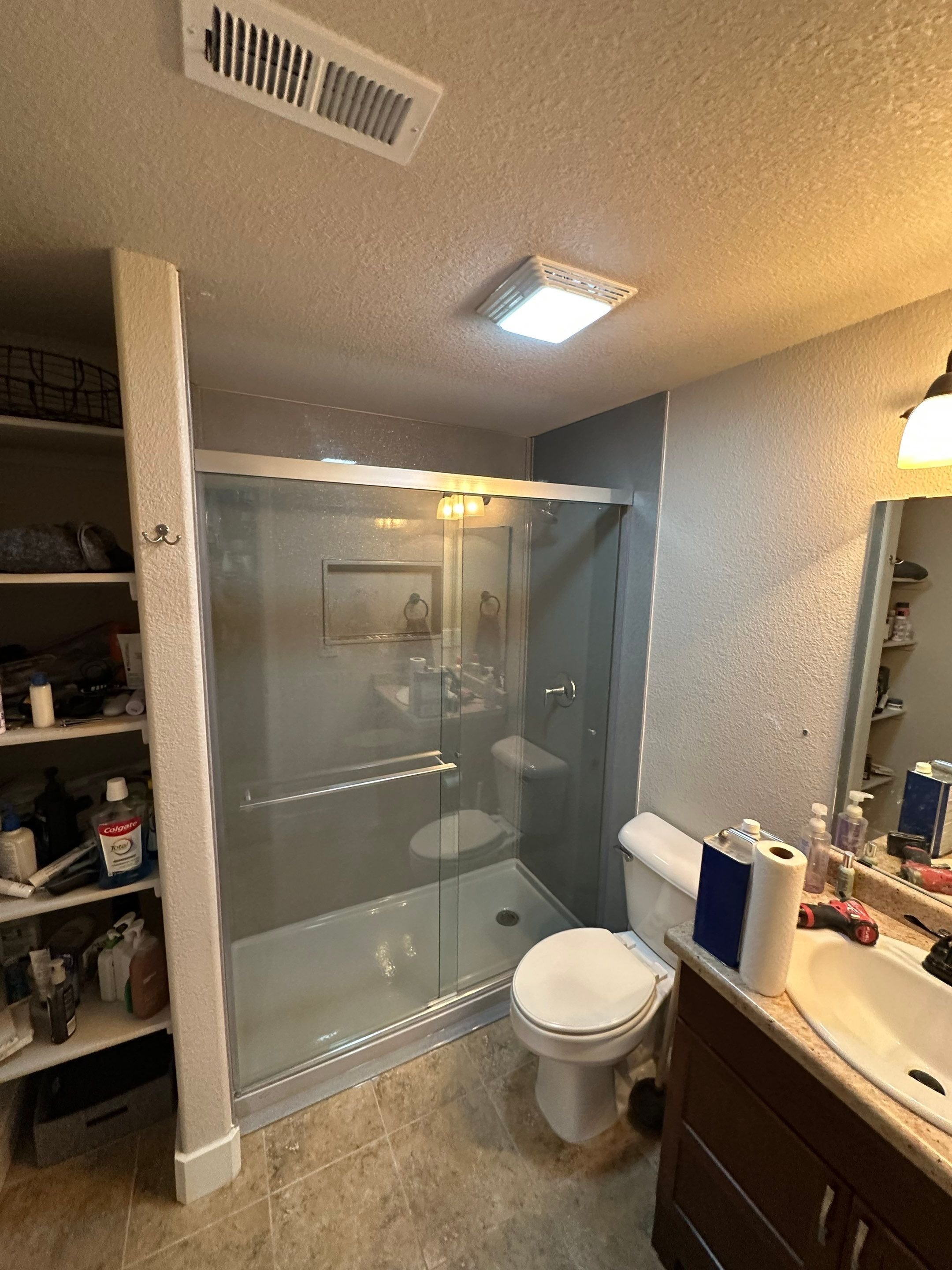 Tub-to-shower conversion on Sowell Street in Cheyenne, WY with low-entry shower base and safer, more accessible layout