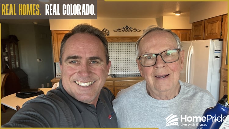 HomePride Bath customer and installer smiling together in the homeowner's Colorado residence